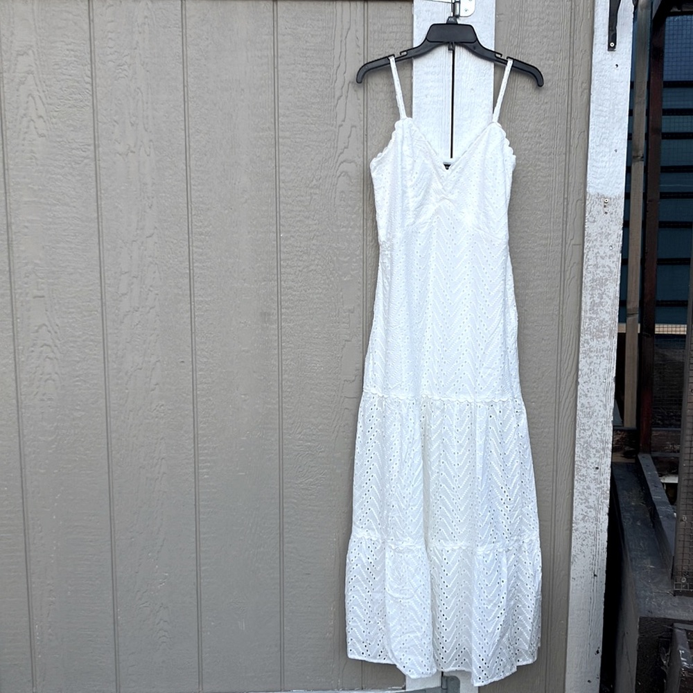 Pure white long maxi dress w/cuts out & w/adjustable straps by Aqua.  Never worn